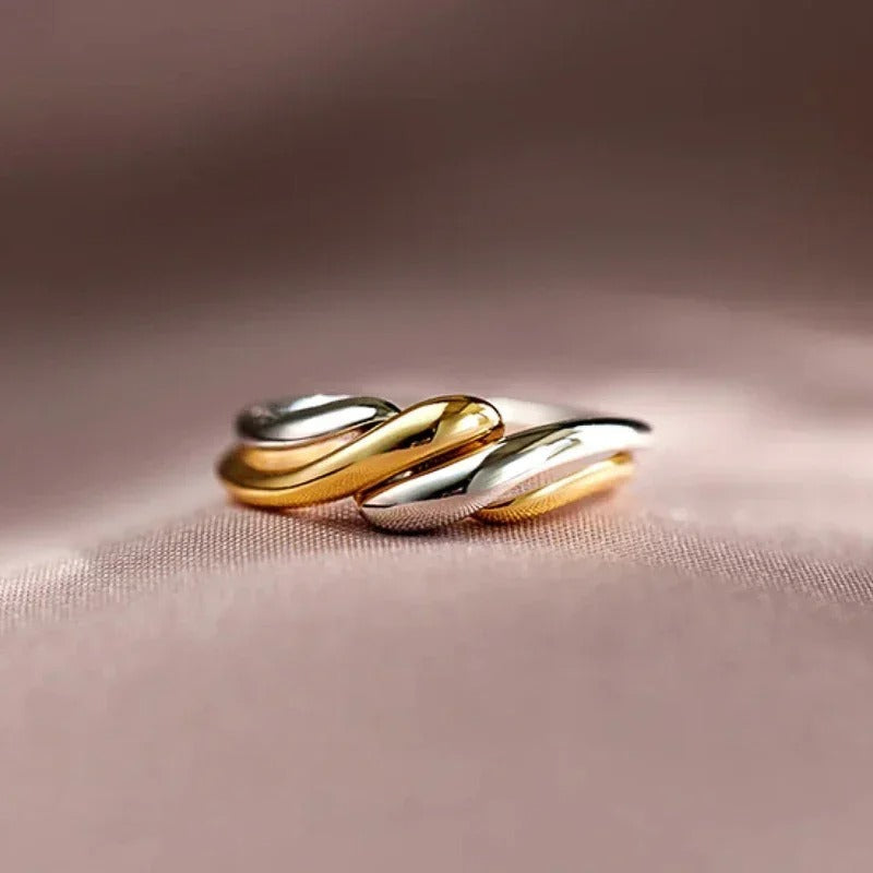 GOLD AND SILVER-COLOURED RING
