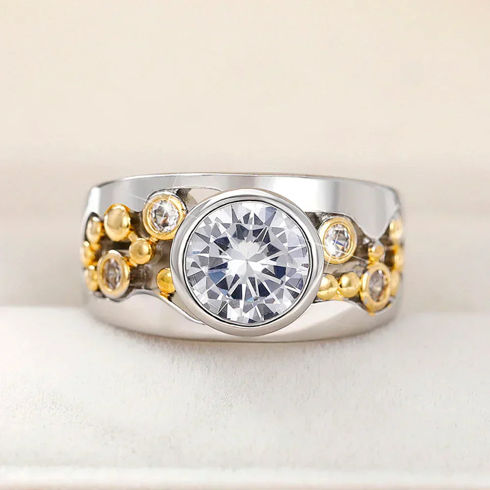 SILVER AND GOLD-COLOURED RING WITH LARGE ROUND ZIRCONIA